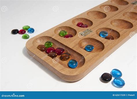Mancala board game stock image. Image of coloured, game - 62617339