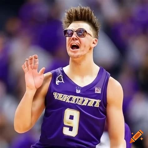 Caucasian basketball player slam dunking for Washington Huskies team on ...
