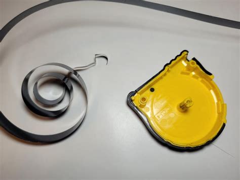 Image result for How to Rewind a Tape Measure Spring