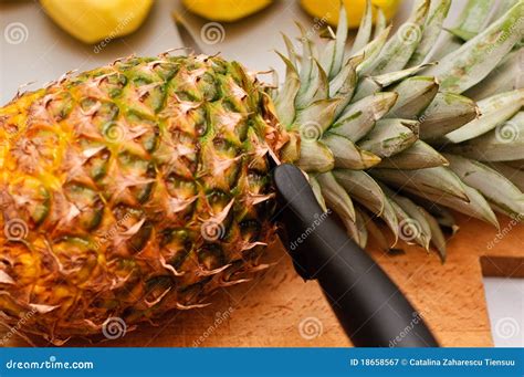 Cutting pineapple stock image. Image of leaves, fruit - 18658567