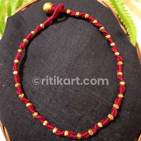 Ancient Collection Dhokra Brass Anklet with Red Threadwork - Ritikart