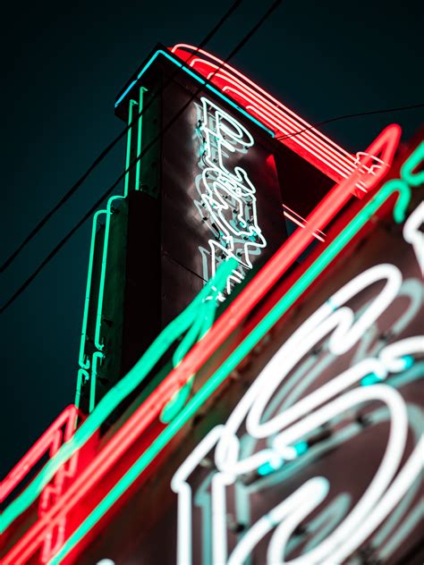 Download Cool Neon Signs At Night Wallpaper | Wallpapers.com