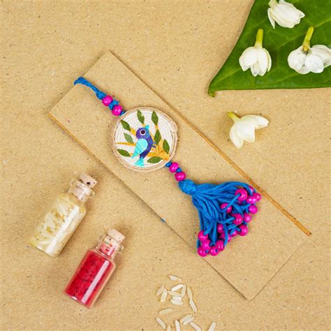 Buy Handmade Pressed Flower Art Bluebird Jute Lumba Rakhi for Bhabhi ...
