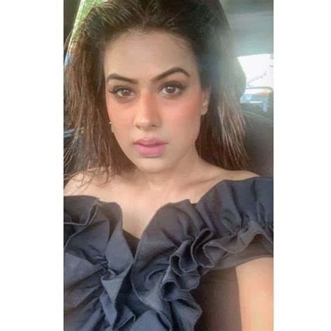 HOT or NOT? Nia Sharma goes bold in a sensual black off-shoulder dress ...