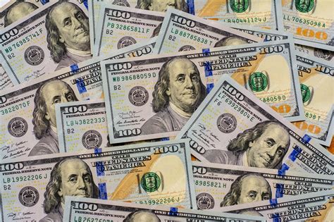 Stacks Of 100 Dollar Bills