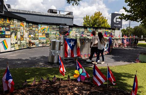 Photos of rainbow crosswalk outside Pulse memorial painted over