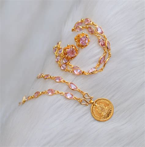 Gold tone Lakshmi coin baby pink stone chain Lakshmi coin pendant set ...