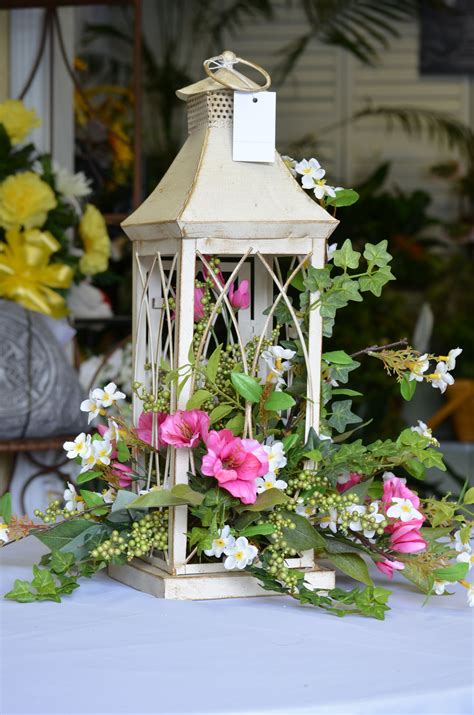 A delightful silk arrangement in a lantern. | Spring lanterns, Silk ...