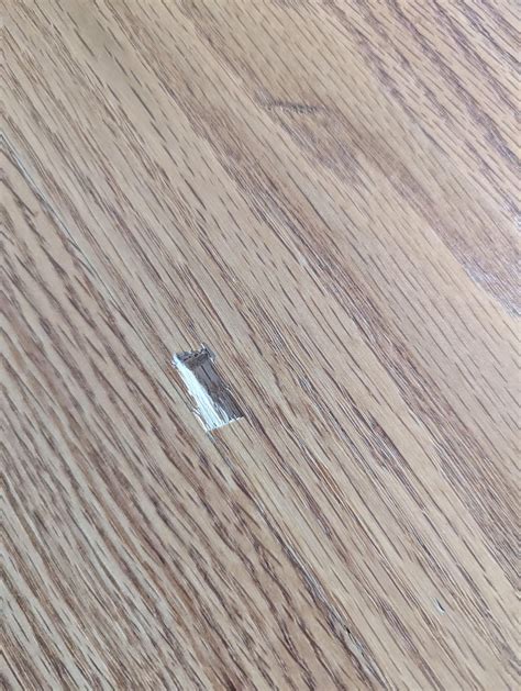 Dent in hardwood floor...putty or use chipped out piece for repair? : r/DIY