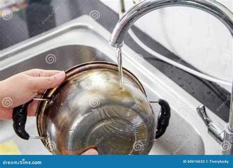 Washing Pans stock image. Image of utensil, metallic - 60616633