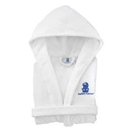 The Ritz-Carlton bath robes hanging in luxury bathroom