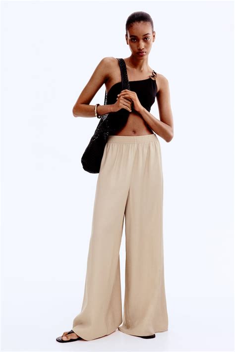 Wide pull-on trousers - Beige - Ladies | H&M IN