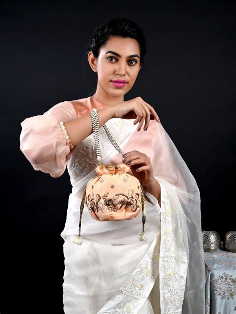 Buy Peach Sweet Potli Bag Online. – Odette