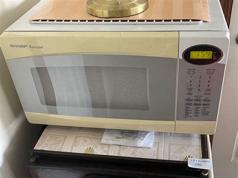 Image result for How to Set Time On Sharp Carousel Microwave