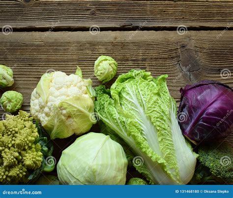 Different Varieties of Cabbages on Wooden Background. Organic Fresh ...