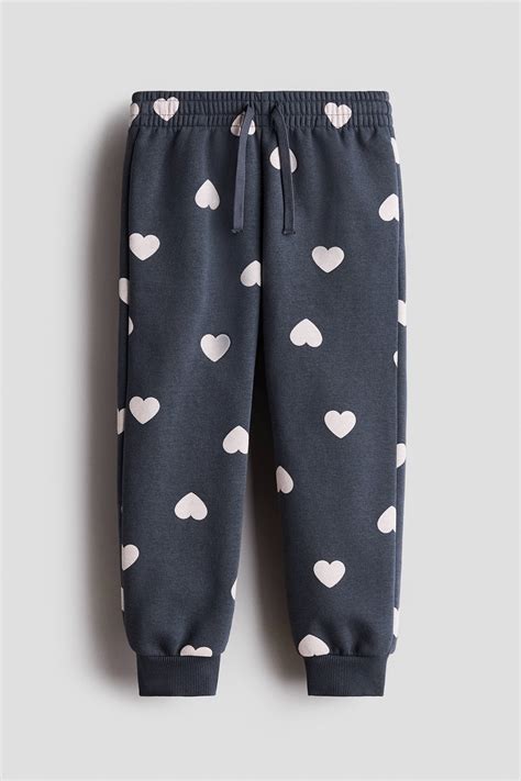 Brushed-inside joggers - Dark grey/Hearts - Kids | H&M IN