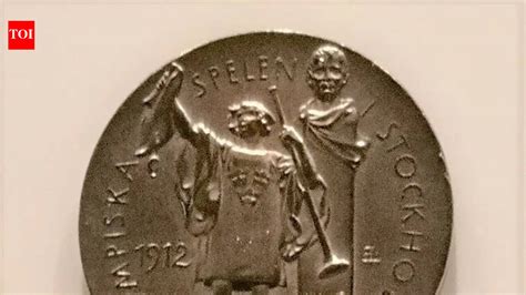 At least six grams of gold coat an Olympic gold medal, which otherwise ...