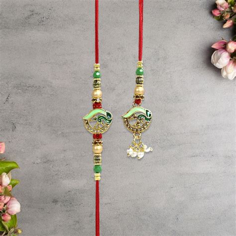 Leaf Motif Bhaiya Bhabhi Rakhi Set with Green Enamel Work and Pearl Da