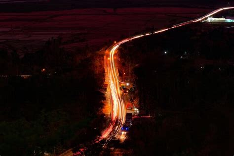 Light trails on road at night | Premium Photo