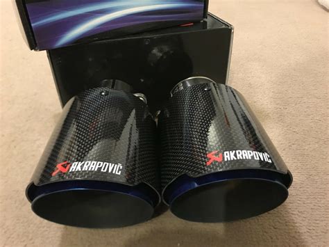 Akrapovic Gloss Black Carbon Fiber Exhaust Tip Blue Stainless Steel | Audistock