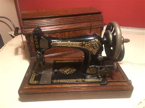 Image result for Hand-Cranked Sewing Machine