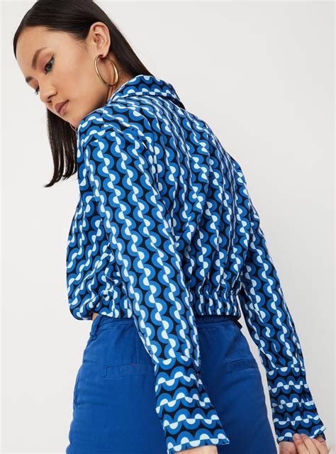 Buy Women Printed Overlap Hem Crop Top Online at just Rs. 799.0 ...