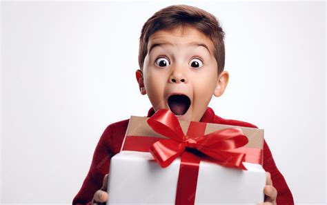 Premium Photo | A surprised kid opening a gift box Birthday gift