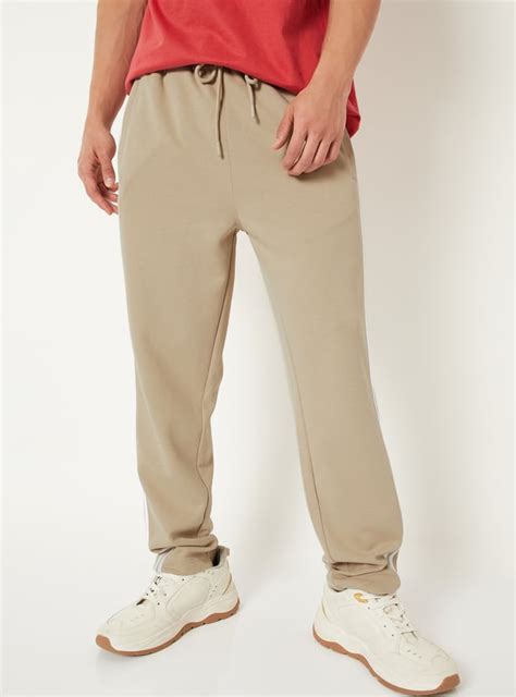 Buy Men Side Stripes Track Pants Online at just Rs. 1199.0 ...