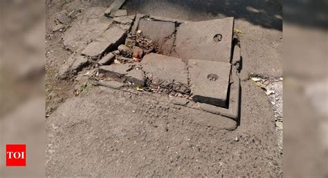 Broken Manhole cover - Times of India