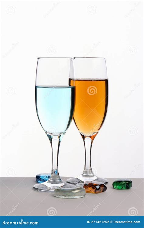 Orange and Blue Colored Cocktail Drinks in Glass Goblets Ornament with ...