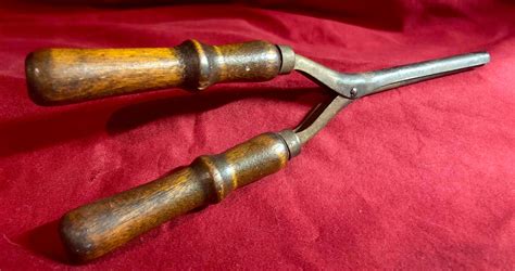 Who Invented The Curling Iron In 1872 at Rosie Halsey blog