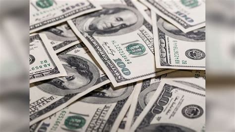 Dollar gains as Fed flags more rate hikes ahead