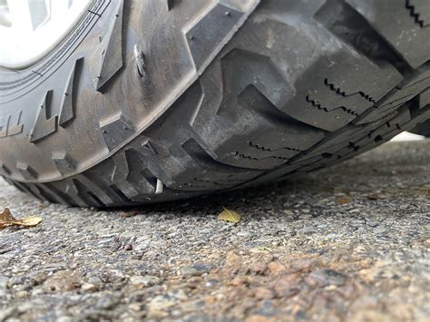 Nail thru tire on AWD car. Not losing air. If I replace, I have to ...