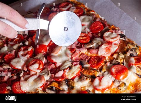 Image result for Someone Using Pizza Cutter