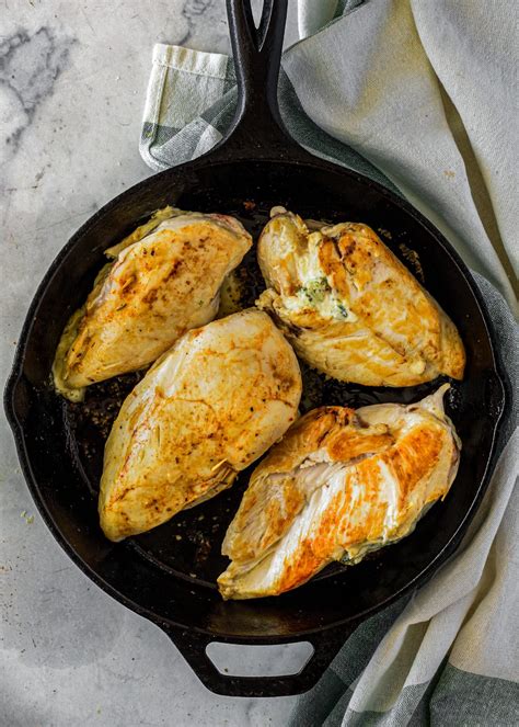 Cheesy Broccoli Stuffed Chicken Breasts - CheekyKitchen