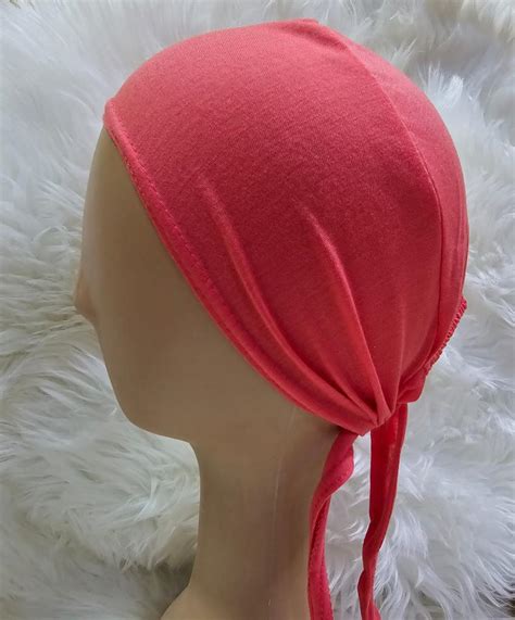 Tieback Cap – Al-Rida