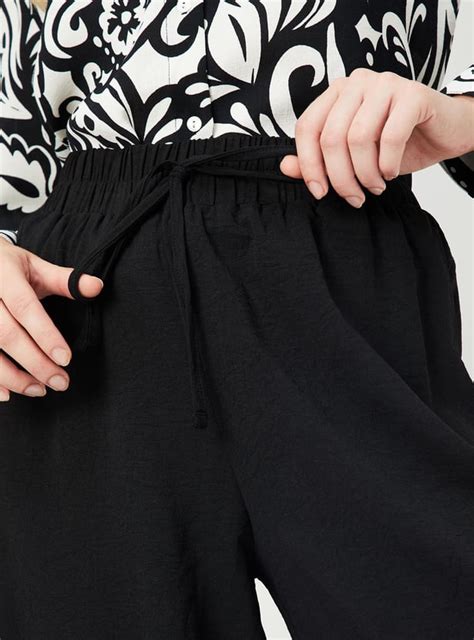 Buy Women Hammered Texture Wide-Leg Trousers Online at just Rs. 999.0 ...