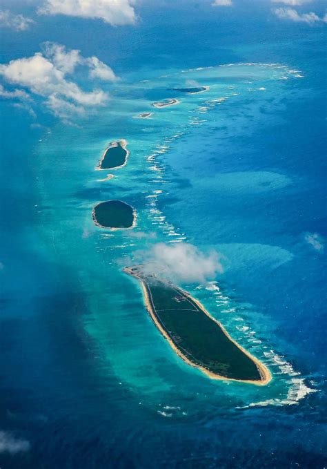 航拍美济礁，吹填成南海最大的岛屿，人工建了条2700米飞机跑道