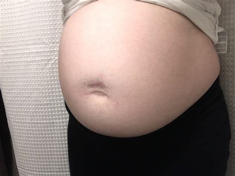 Pregnant Belly Button Pop