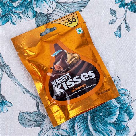 Send Donut Rakhi with Hershey's Kisses Chocolate and Almonds Online ...