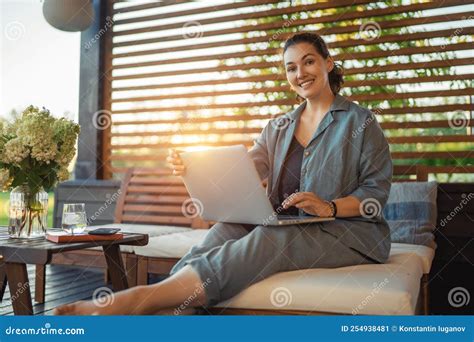 Woman is Working Sitting on the Patio Stock Image - Image of girl ...