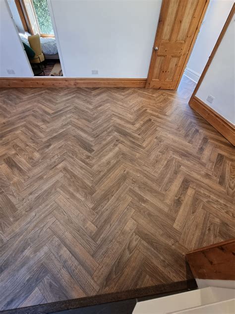 Xylo Urban Herringbone San Francisco Java Brown Laminate Flooring | The ...