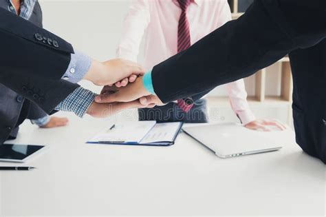 Teamwork Hands Together 的图像结果