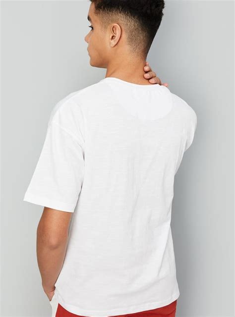 Buy Boys Solid Drop Shoulder T-shirt Online at just Rs. 399.0 ...