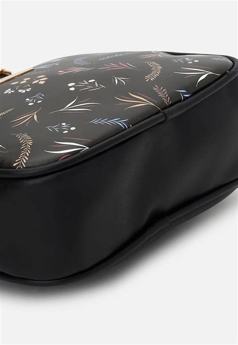 Buy Women Printed Zip Sling Bag Online at just Rs. 899.0 ...