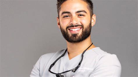 Who Is Ahmed ElKoussa, Miami Dentist Fired For Tearing Down Posters Of ...