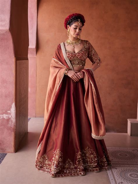 Maroon and beige shimmer tissue silk blouse, lehenga and dupatta ...