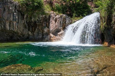 Tourist jumped off waterfall and gave thumbs up after landing, before ...