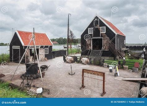 Traditional Fishing Village with Small Houses, a Church and Ships ...