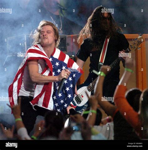 Kid Rock performs at Super Bowl XXXVIII half time show. The New England ...